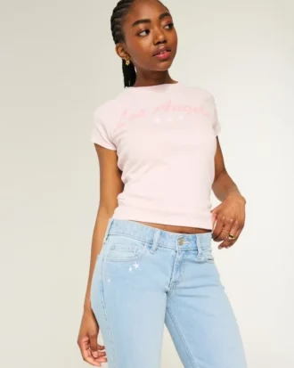 Blugi bootcut cu talie joasă și broderie cu stele