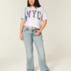 Blugi bootcut cu talie joasă și spălare deschisă Blugi bootcut cu talie joasă și spălare deschisă