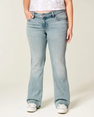 Blugi bootcut cu talie joasă și spălare deschisă