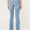 Blugi bootcut cu talie joasă și spălare deschisă Blugi bootcut cu talie joasă și spălare deschisă