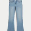Blugi bootcut cu talie joasă și spălare deschisă Blugi bootcut cu talie joasă și spălare deschisă