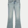 Blugi bootcut cu talie joasă și spălare deschisă Blugi bootcut cu talie joasă și spălare deschisă