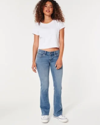 Blugi bootcut cu talie joasă și spălare medie