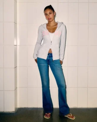 Blugi bootcut cu talie joasă și spălare medie