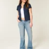 Blugi bootcut cu talie joasă și spălare medie Blugi bootcut cu talie joasă și spălare medie