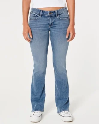 Blugi bootcut cu talie joasă și spălare medie