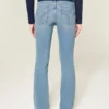 Blugi bootcut cu talie joasă și spălare medie Blugi bootcut cu talie joasă și spălare medie