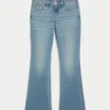 Blugi bootcut cu talie joasă și spălare medie Blugi bootcut cu talie joasă și spălare medie