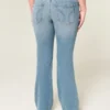 Blugi bootcut cu talie joasă și spălare medie Blugi bootcut cu talie joasă și spălare medie