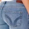 Blugi bootcut cu talie joasă și spălare medie Blugi bootcut cu talie joasă și spălare medie