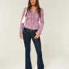 Blugi bootcut cu talie joasă și spălare închisă Blugi bootcut cu talie joasă și spălare închisă