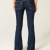 Blugi bootcut cu talie joasă și spălare închisă Blugi bootcut cu talie joasă și spălare închisă