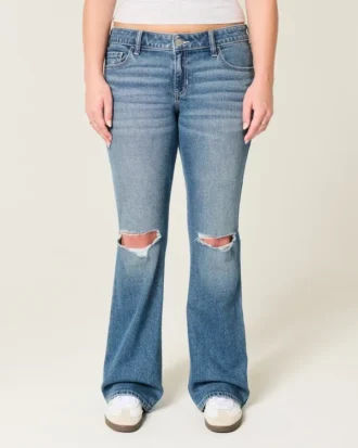 Blugi bootcut cu talie joasă, spălați mediu și rupți