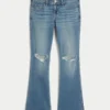 Blugi bootcut cu talie joasă, spălați mediu și rupți Blugi bootcut cu talie joasă, spălați mediu și rupți