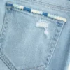 Blugi bootcut cu talie joasă, spălați ușor, cu broderie și rupturi Blugi bootcut cu talie joasă, spălați ușor, cu broderie și rupturi