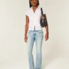 Blugi bootcut cu talie joasă, spălare medie, brodați cu fluturi Blugi bootcut cu talie joasă, spălare medie, brodați cu fluturi