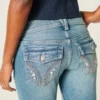 Blugi bootcut cu talie joasă, spălare medie și broderii florale