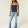 Blugi bootcut cu talie joasă, spălare medie și broderii florale