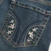 Blugi bootcut cu talie joasă, spălare închisă și broderie Blugi bootcut cu talie joasă, spălare închisă și broderie