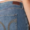 Blugi bootcut cu talie medie și spălare medie Blugi bootcut cu talie medie și spălare medie