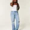 Blugi dad jeans cu talie înaltă, croi curbat, spălați mediu, cu rupturi Blugi dad jeans cu talie înaltă, croi curbat, spălați mediu, cu rupturi