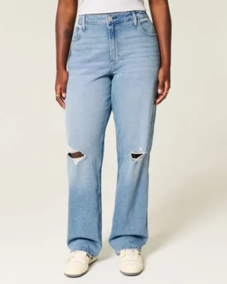 Blugi dad jeans cu talie înaltă, croi curbat, spălați mediu, cu rupturi