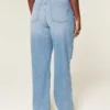 Blugi dad jeans cu talie înaltă, croi curbat, spălați mediu, cu rupturi Blugi dad jeans cu talie înaltă, croi curbat, spălați mediu, cu rupturi