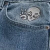 Blugi largi cu imprimeu Alien, spălare medie Blugi largi cu imprimeu Alien, spălare medie