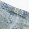 Blugi largi, cu talie foarte joasă, spălare deschisă și cataramă în spate Blugi largi, cu talie foarte joasă, spălare deschisă și cataramă în spate