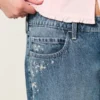 Blugi largi, cu talie joasă, spălați închis la culoare, cu broderie florală Blugi largi, cu talie joasă, spălați închis la culoare, cu broderie florală