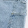 Blugi largi, de culoare deschisă, pentru pictori Blugi largi, de culoare deschisă, pentru pictori