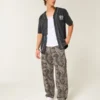 Blugi largi de pictor Camo Skater Blugi largi de pictor Camo Skater