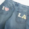 Blugi largi Los Angeles cu talie joasă și spălare medie Blugi largi Los Angeles cu talie joasă și spălare medie