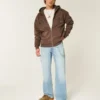 Blugi relaxați cu croi bootcut și spălare deschisă Blugi relaxați cu croi bootcut și spălare deschisă
