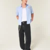 Blugi super largi cu imprimeu negru spălat Blugi super largi cu imprimeu negru spălat