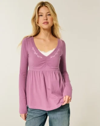 Bluză babydoll cu mâneci lungi și bust strâns