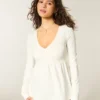 Bluză babydoll cu mâneci lungi și bust strâns Bluză babydoll cu mâneci lungi și bust strâns