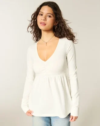 Bluză babydoll cu mâneci lungi și bust strâns