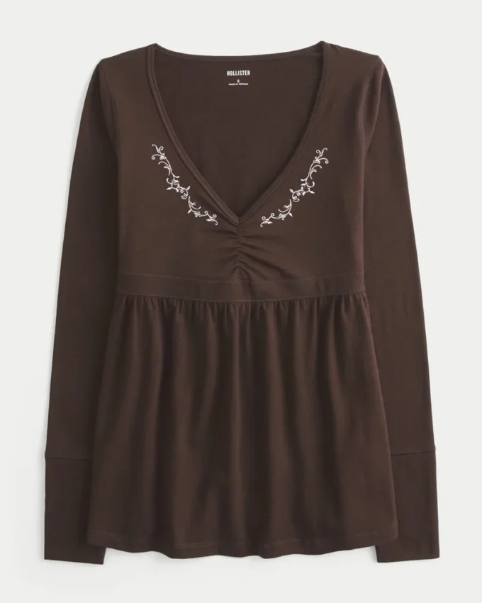 Bluză babydoll cu mâneci lungi și bust strâns Bluză babydoll cu mâneci lungi și bust strâns
