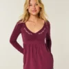 Bluză babydoll cu mâneci lungi și bust strâns Bluză babydoll cu mâneci lungi și bust strâns