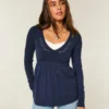 Bluză babydoll cu mâneci lungi și bust strâns Bluză babydoll cu mâneci lungi și bust strâns