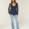 Bluză babydoll cu mâneci lungi și bust strâns Bluză babydoll cu mâneci lungi și bust strâns