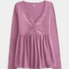 Bluză babydoll cu mâneci lungi și bust strâns Bluză babydoll cu mâneci lungi și bust strâns