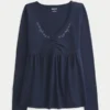 Bluză babydoll cu mâneci lungi și bust strâns Bluză babydoll cu mâneci lungi și bust strâns