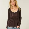 Bluză cu mâneci lungi Henley Babydoll Bluză cu mâneci lungi Henley Babydoll