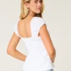 Bluză cu mâneci scurte din poplin elastic Bluză cu mâneci scurte din poplin elastic