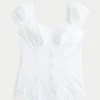 Bluză cu mâneci scurte din poplin elastic Bluză cu mâneci scurte din poplin elastic