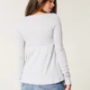 Bluză lungă cu mâneci lungi și model pointelle Bluză lungă cu mâneci lungi și model pointelle