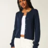 Cardigan cu ochiuri Cardigan cu ochiuri