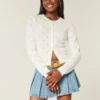 Cardigan cu ochiuri Cardigan cu ochiuri